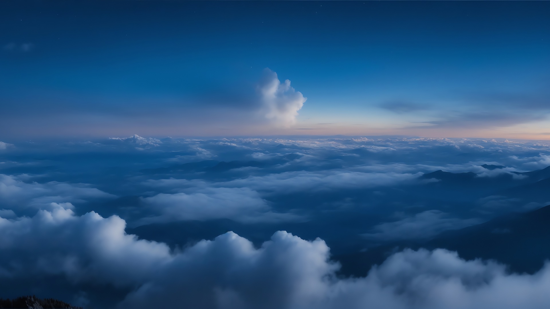 An image of the sky above the clouds at high altitude.